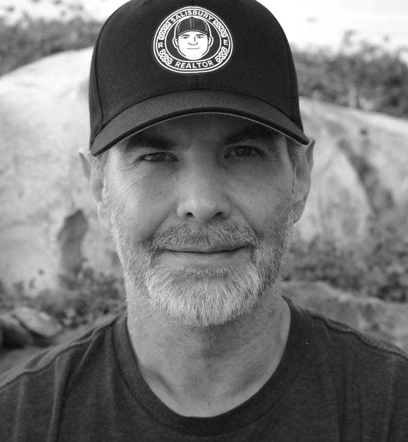 Cory Salisbury, REALTOR® with Simple Choice Real Estate, wearing a Salisbury Realtor cap